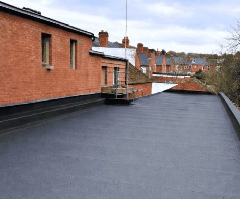Commercial flat roofing torch on felt Bearwood
