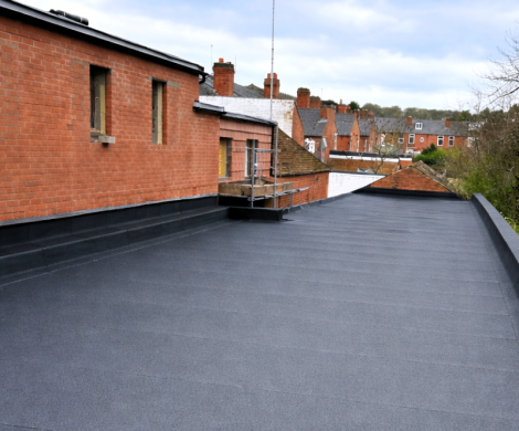 Commercial flat roofing torch on felt Bearwood